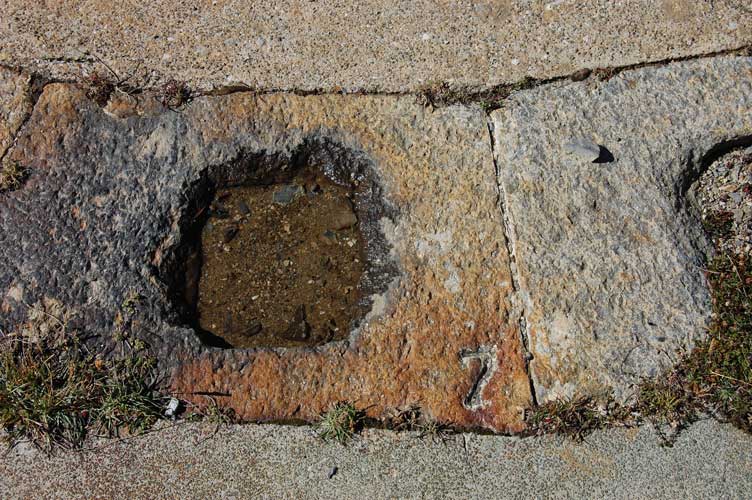 Particolare di una tacca con il numero del settore di tiro